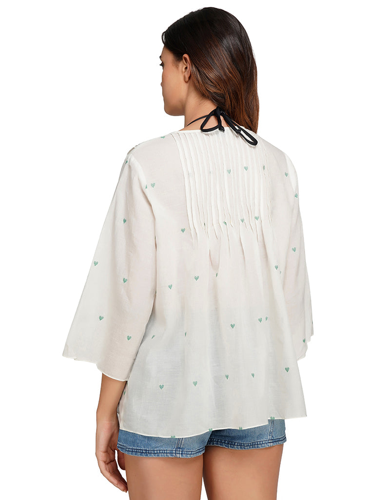 Pintuck trademark overlay top